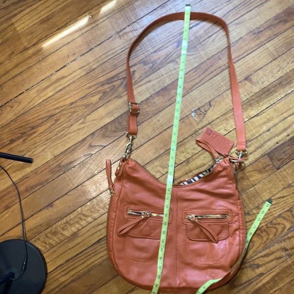 Linea Pelle Cross body added dressed coin purse. - Picture 3 of 11